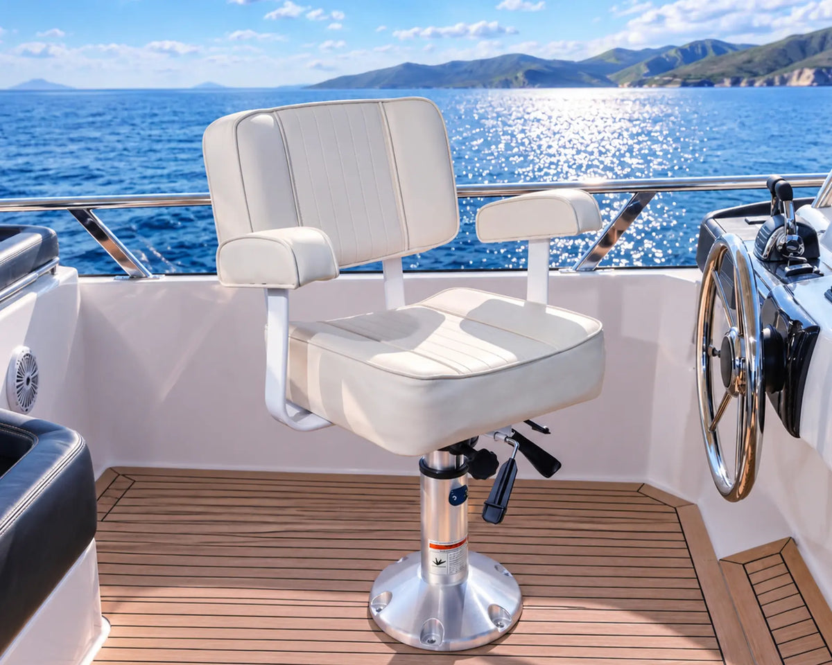 White Marinexplore captain's boat seat with armrests installed beside the helm on a pedestal.