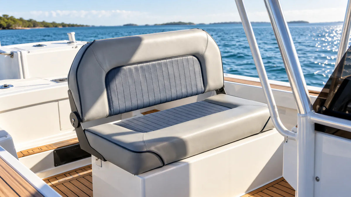 Two-person folding boat bench seat installed on a flat support platform with usable space around it