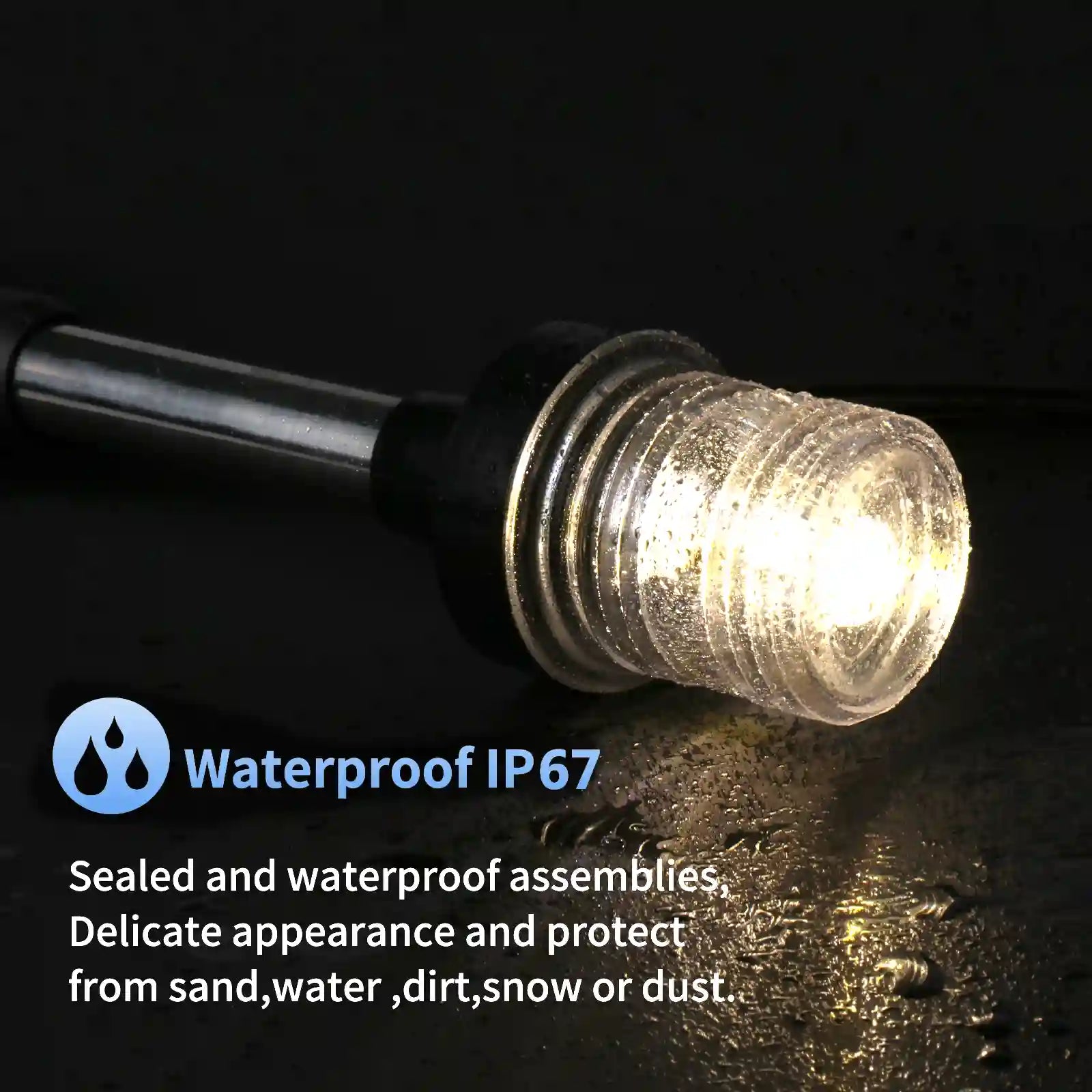Close-up of a Marinexplore anchor light lens covered in water droplets and glowing warm white in the dark, illustrating its IP67 waterproof rating.