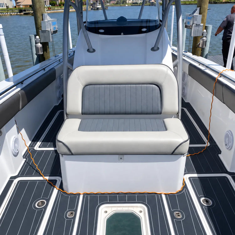 White and gray boat bench seat installed in front of the center console.