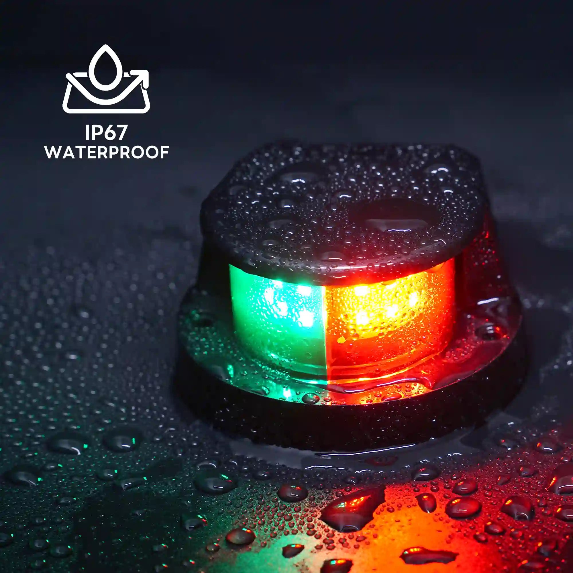 Close-up of a Marinexplore black bow navigation light covered in water droplets on a dark wet surface, with the IP67 waterproof icon and label in the top left corner and the red and green LED lens glowing brightly through the rain.