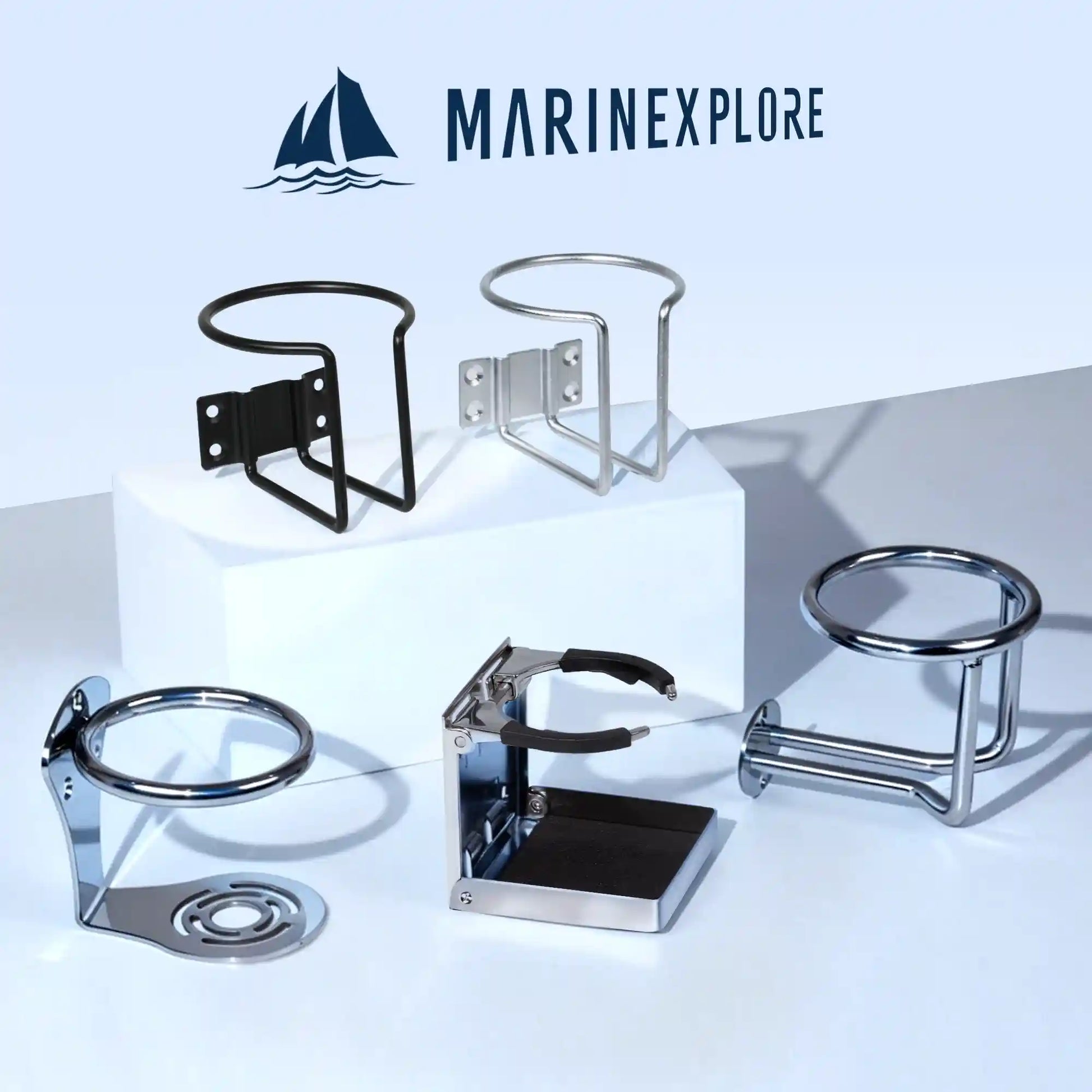 Marinexplore brand logo at the top with five different boat cup holder models displayed together on a white studio surface, including the black wire-frame wall mount, silver wire-frame wall mount, chrome flush-mount ring, foldable chrome adjustable holder, and cylindrical chrome tube mount.