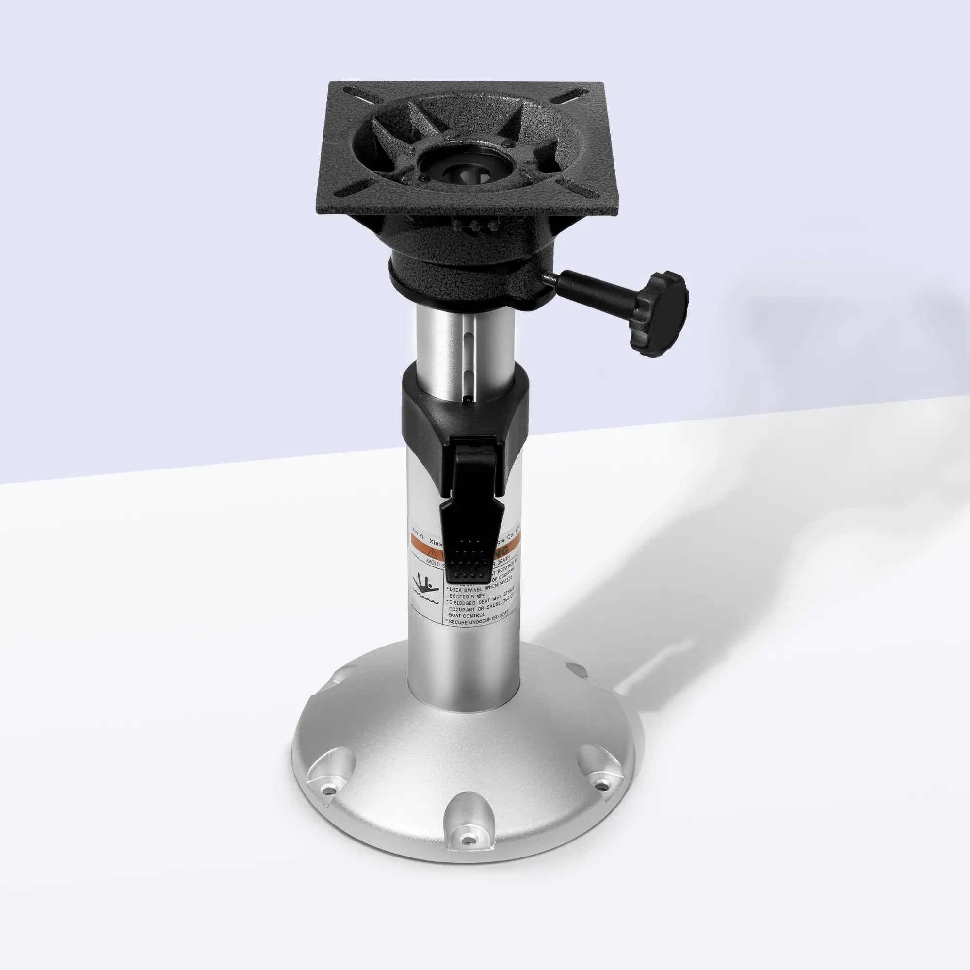 A high-angle studio shot of the Marinexplore silver anodized aluminum boat seat pedestal with a black locking knob and heavy-duty top plate.