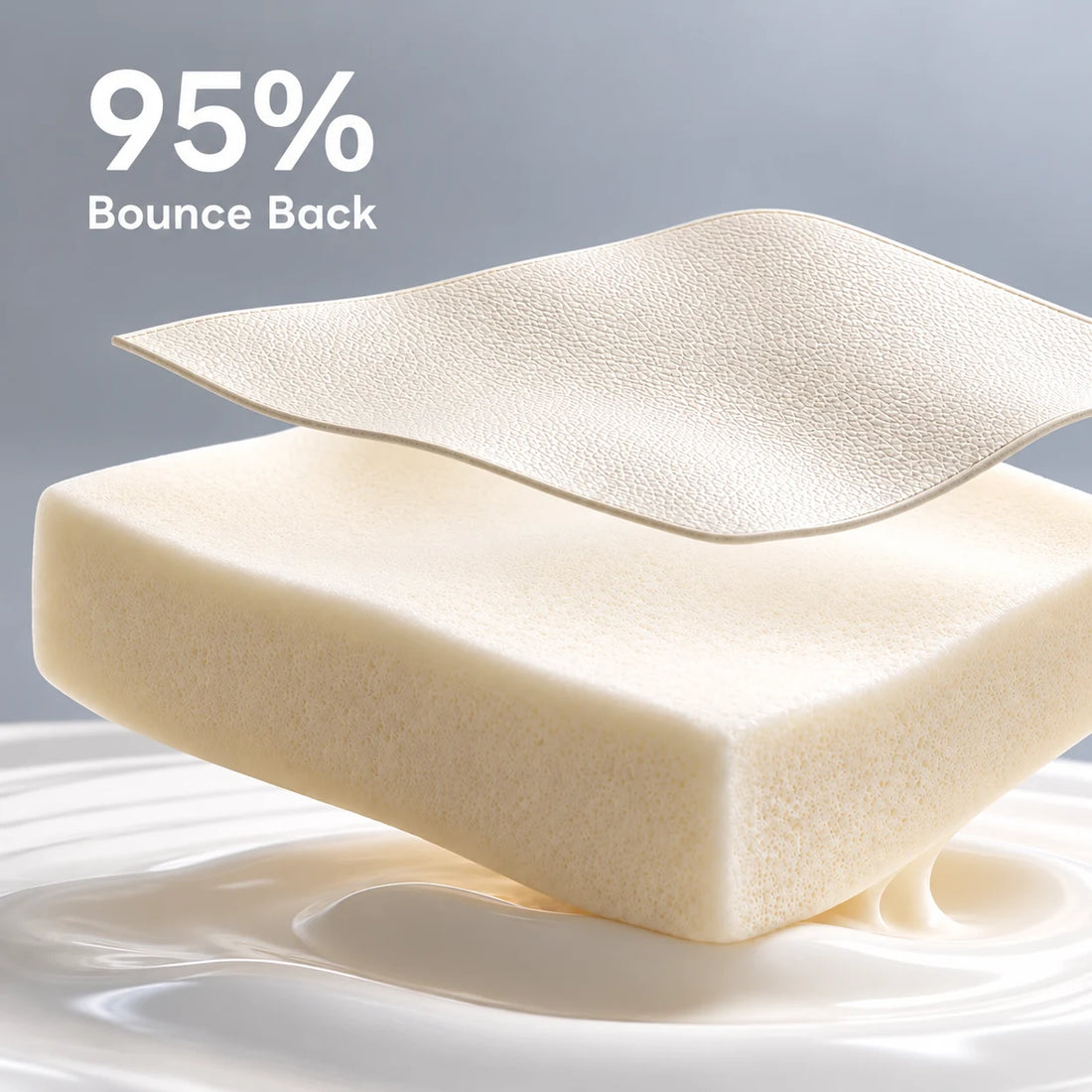 Cream marine vinyl positioned above a matching boat seat foam cushion in a two-layer material display.