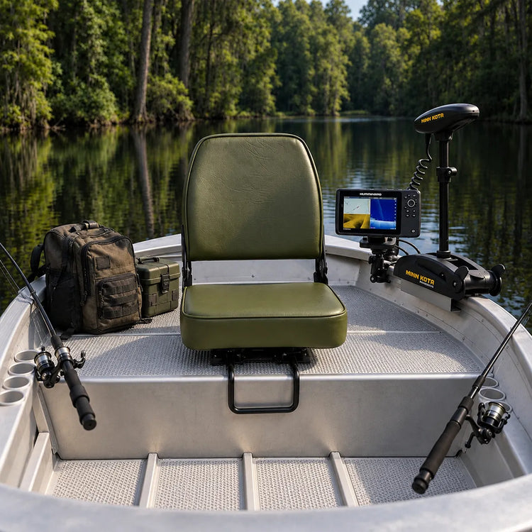 Green fold-down fishing boat seat installed on the bow deck with rods and fish finder nearby.
