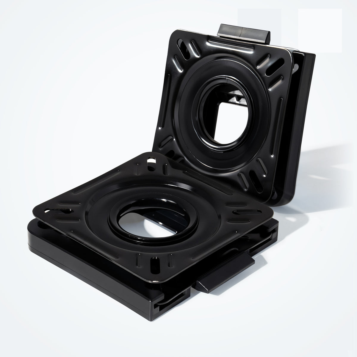 Marinexplore black quick disconnect seat mount with boat seat swivel, showing upper and lower plate separated, angled product view.