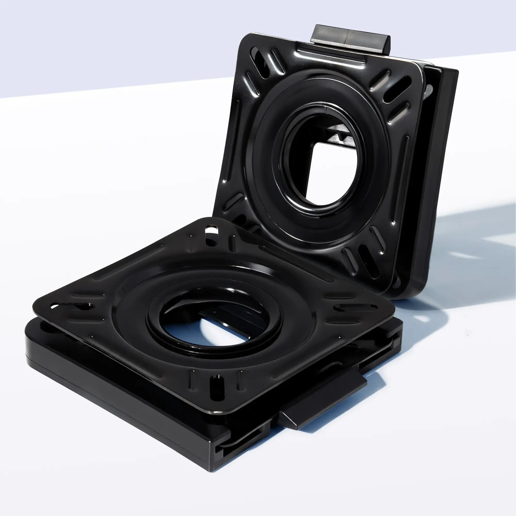 Marinexplore black quick disconnect seat mount with boat seat swivel, showing upper and lower plate separated, angled product view.