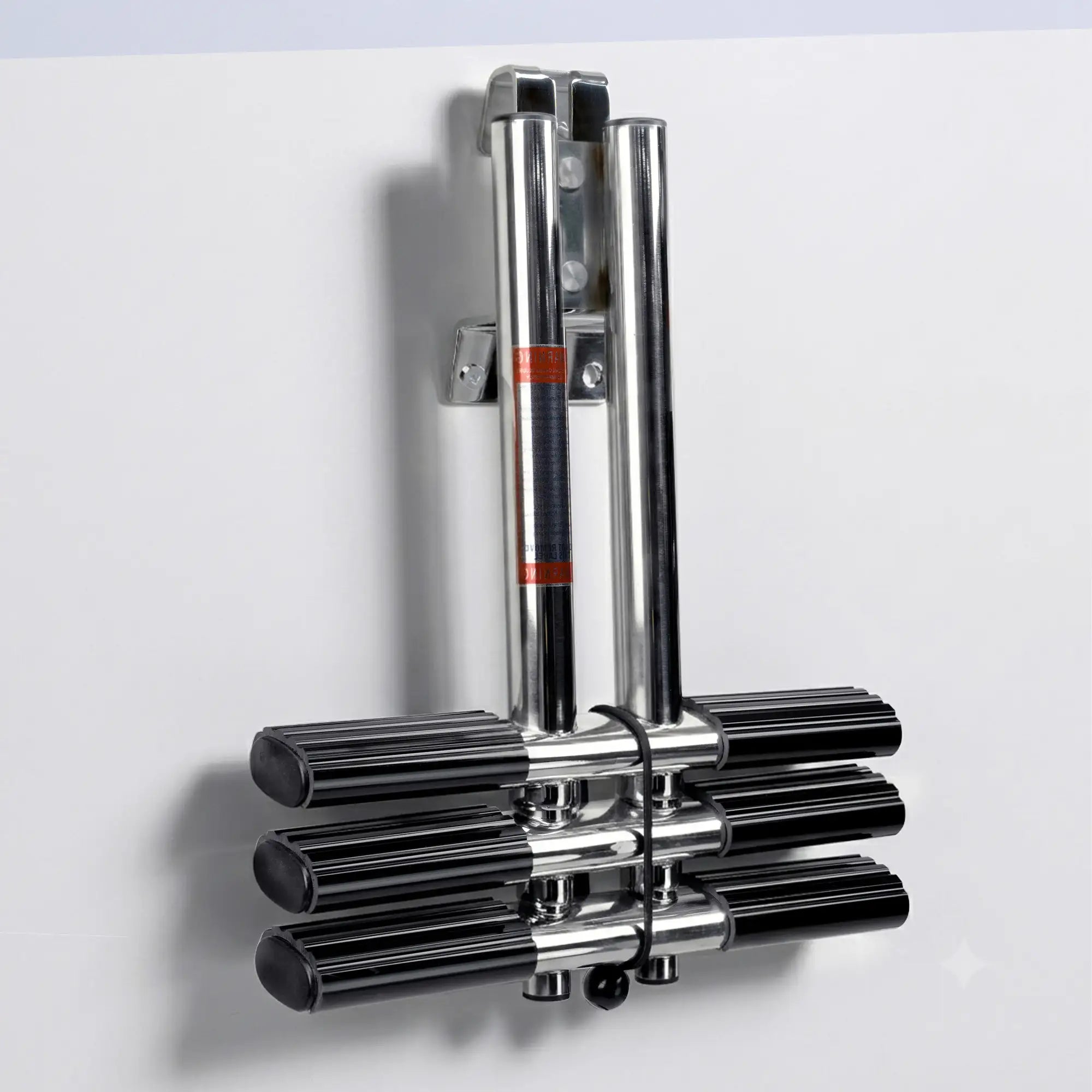 Marinexplore 3-step removable boat ladder in folded position hung on white boat wall, featuring U-shaped quick-release hook bracket for tool-free attachment, three pairs of wide black oval non-slip treads collapsed, with bungee cord lock, angled side view.