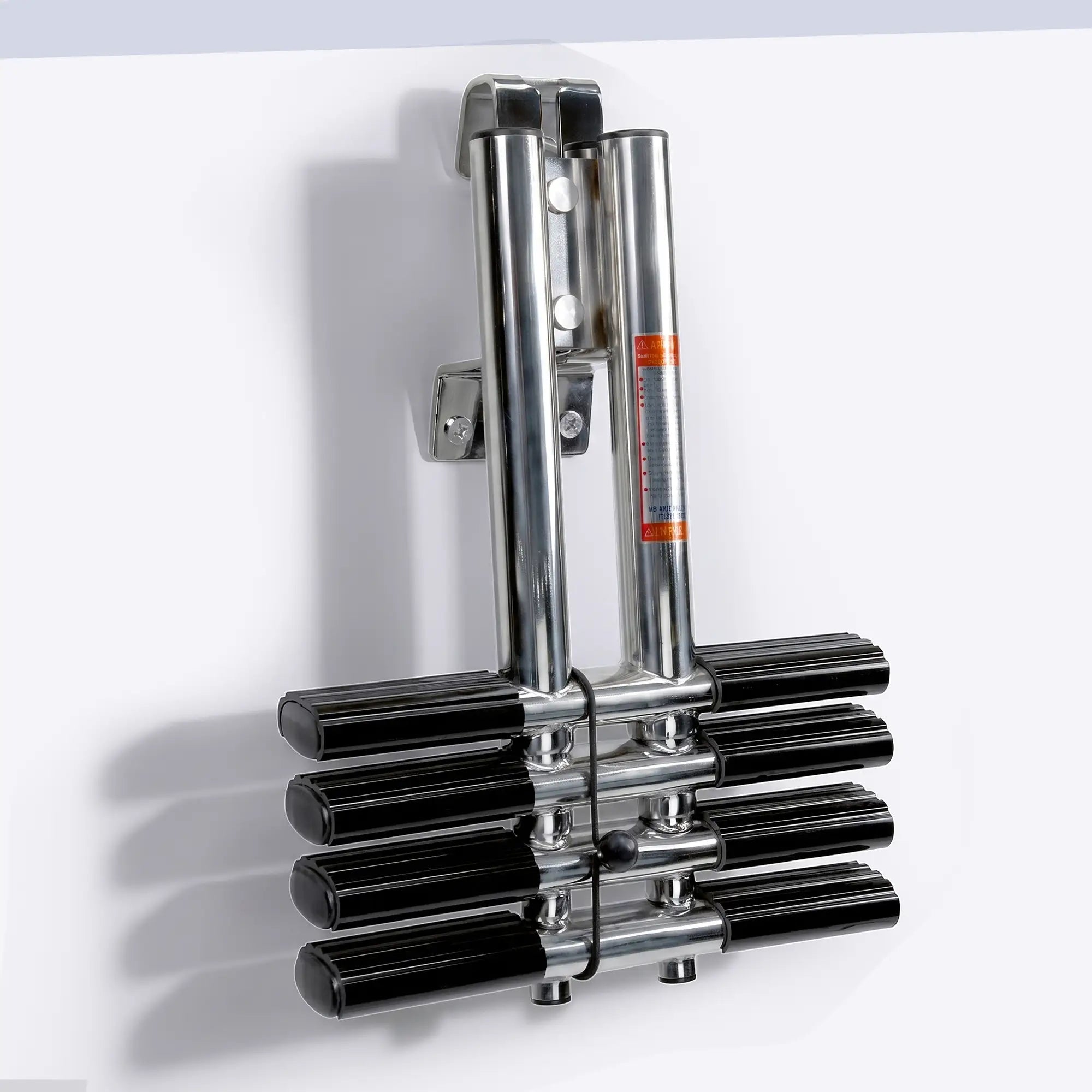 Marinexplore 4-step removable boat ladder in folded position mounted on white boat wall, showing U-shaped quick-release hook bracket at top with side wall support plate, four pairs of wide black oval non-slip treads collapsed with bungee cord lock, real photo front view.