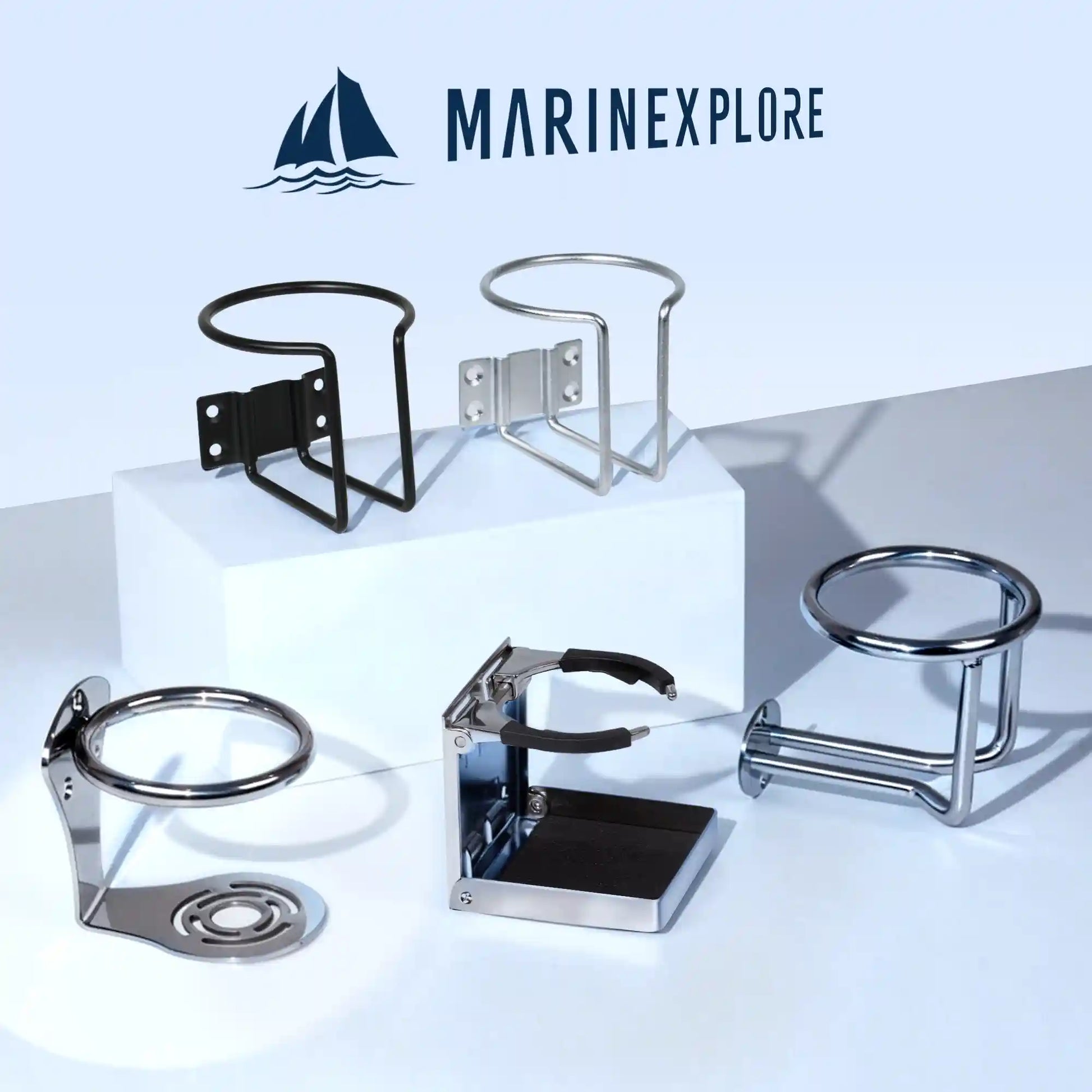 Marinexplore brand logo at the top with five different boat cup holder models displayed on a white studio surface, including a black wire-frame wall-mount, silver wire-frame wall-mount, the chrome hourglass-base ring cup holder featured in this listing, a folding adjustable chrome holder, and a chrome cylindrical surface-mount holder.