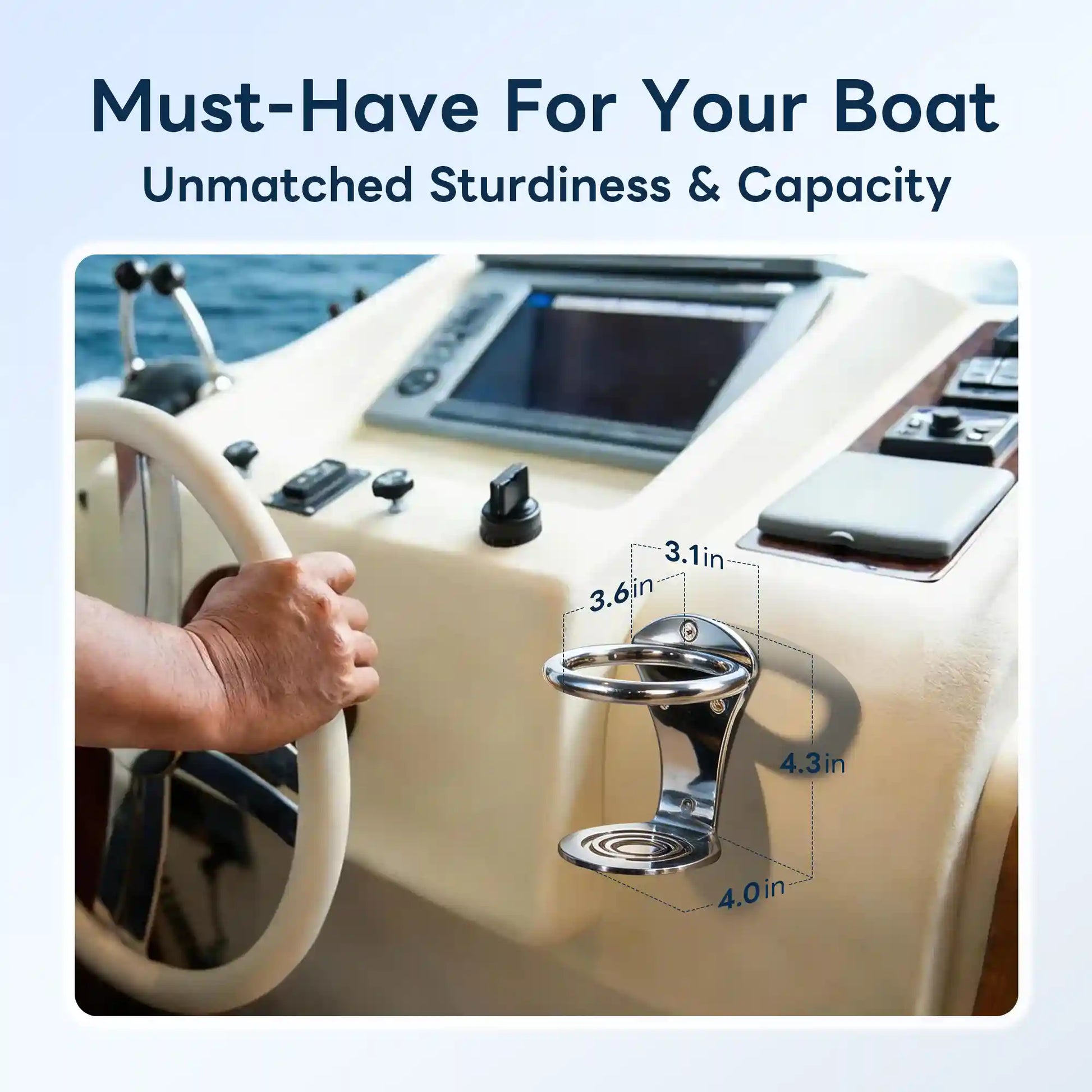 Marinexplore chrome stainless steel ring boat cup holder mounted on the side panel of a yacht helm console, with a hand gripping the white steering wheel in the foreground and four dimension callouts showing 3.1-inch and 3.6-inch top ring opening, 4.3-inch overall height, and 4.0-inch base plate diameter.