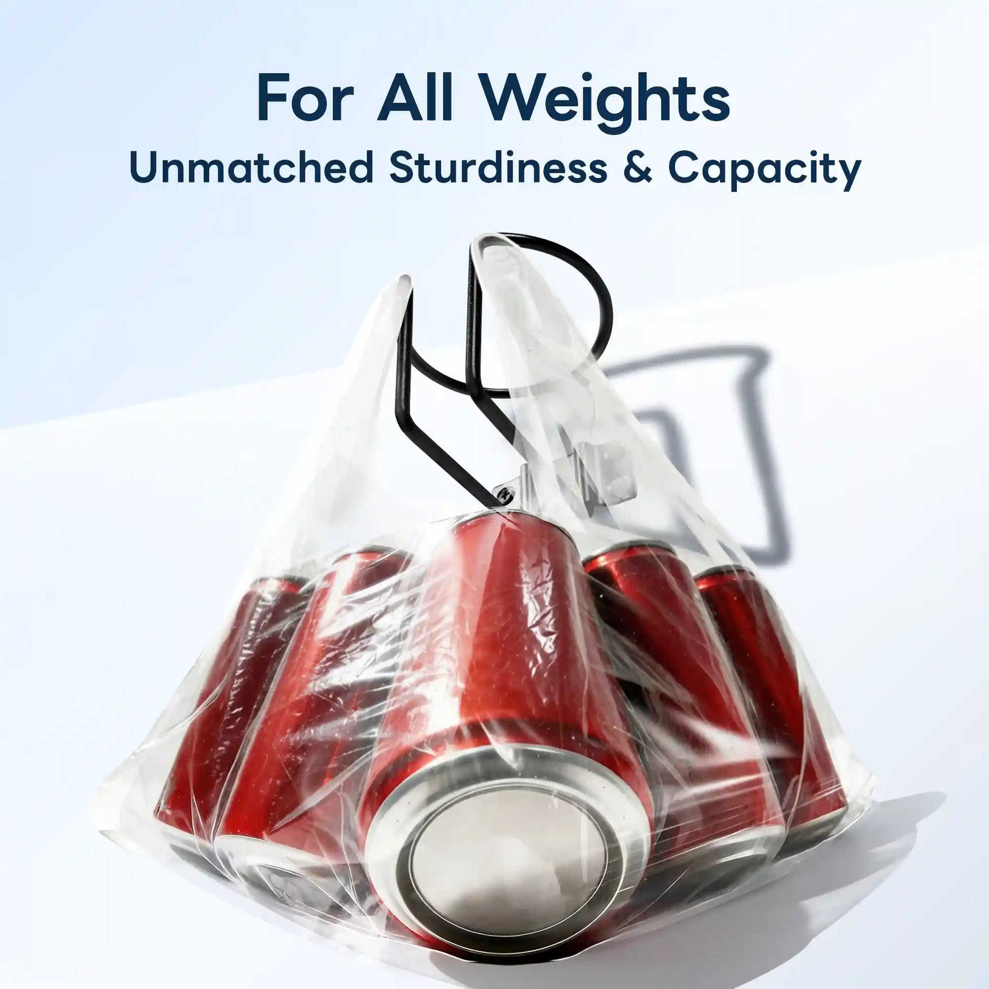 Marinexplore black stainless steel boat cup holder lifting a clear plastic bag packed with multiple red soda cans, proving its reinforced wire-frame construction can handle heavy drink loads without bending or failing.