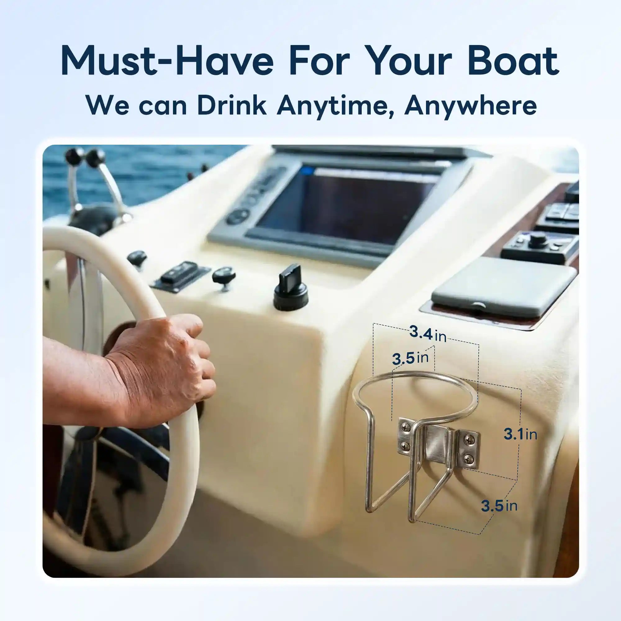 Marinexplore silver stainless steel cup holder installed on the side panel of a yacht cockpit dashboard, with a hand gripping the steering wheel in the foreground and dimension annotations showing 3.4-inch and 3.5-inch opening width and 3.1-inch by 3.5-inch holder body size.